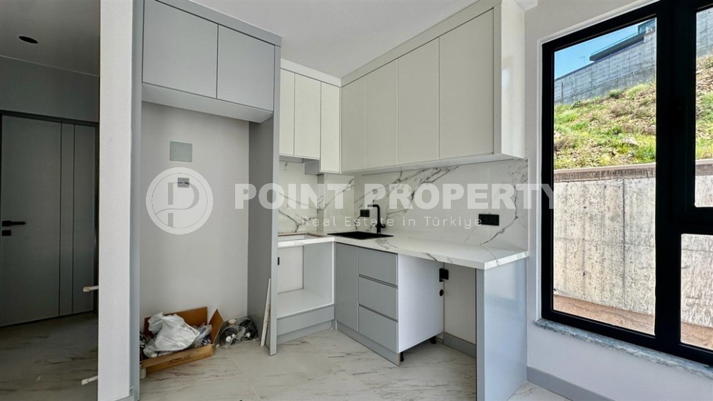 Новая квартира с чистовой отделкой в полутора километрах от моря, в престижном районе Аланьи - Каргыджак-id-7531-фото-3