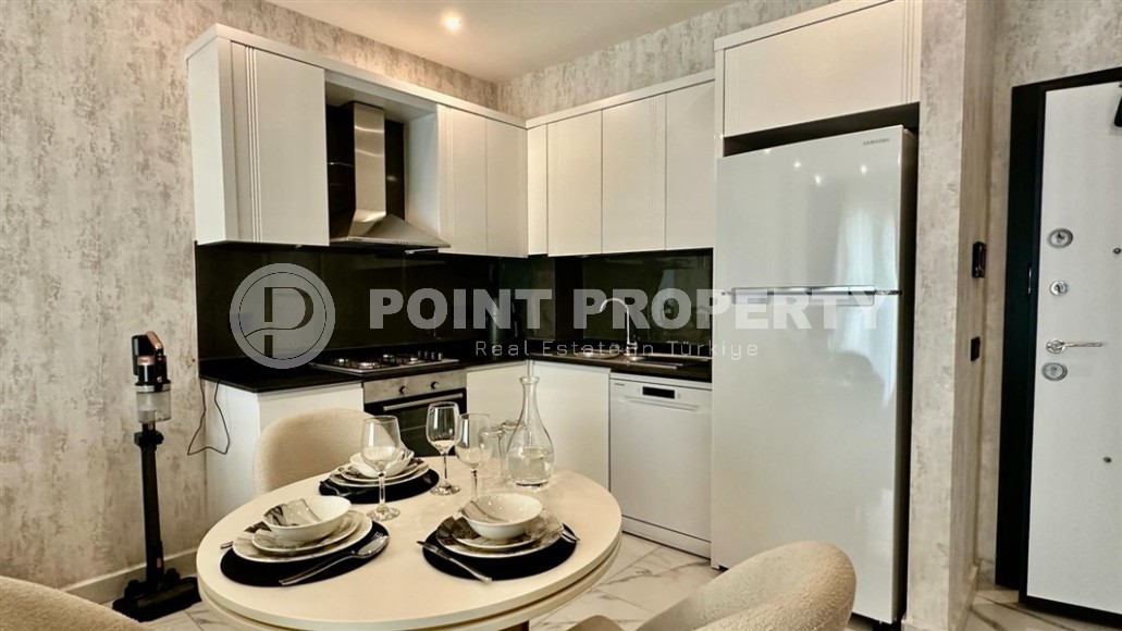 Small comfortable apartment with a private garden, in a new residential complex with hotel infrastructure-id-7534-photo-4