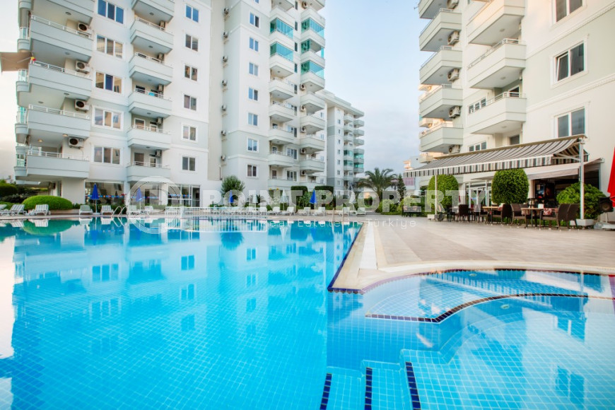 Квартира с двумя спальнями, 110м², в комфортабельном комплексе у моря в районе Тосмур, Алания-id-1581-фото-2