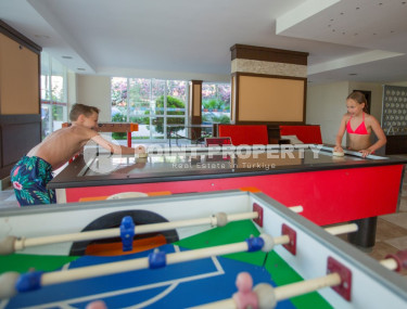 Квартира с двумя спальнями, 110м², в комфортабельном комплексе у моря в районе Тосмур, Алания-id-1581-фото-4