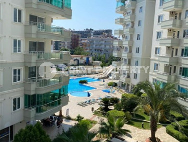 Квартира с двумя спальнями, 110м², в комфортабельном комплексе у моря в районе Тосмур, Алания-id-1581-фото-5