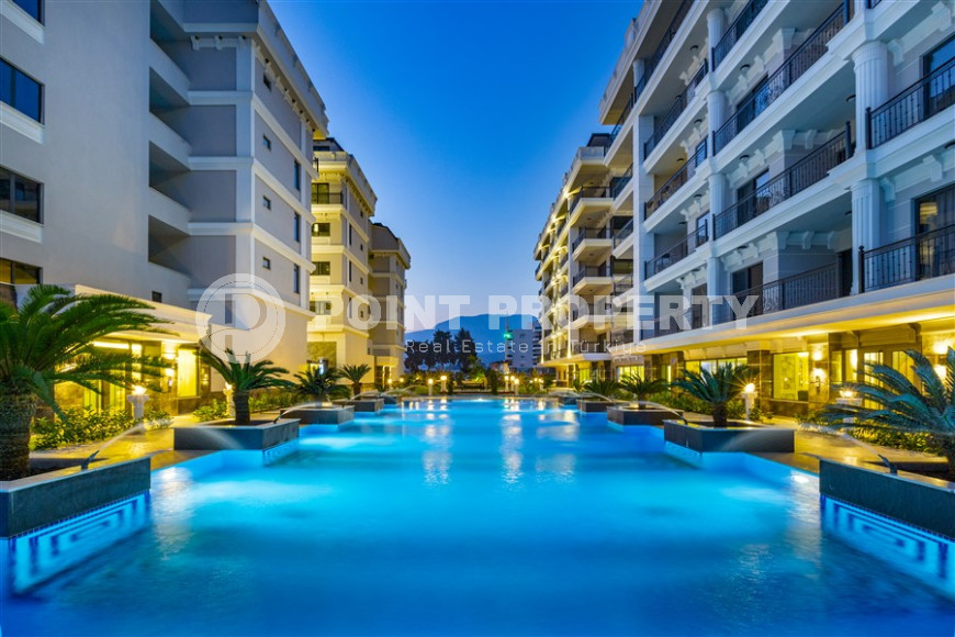 Apartments 2+1 and 3+1 from the developer in a modern complex 200 meters from the sea, Kargicak-id-1084-photo-1