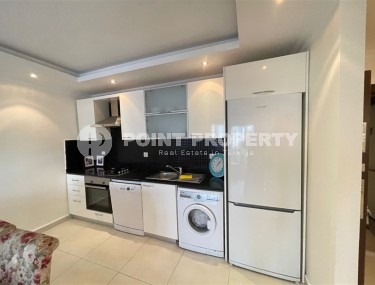 Furnished apartment 1+1, with a total area of 65 m2, in a comfortable residential complex with hotel infrastructure, built in 2014.-id-7562-photo-4