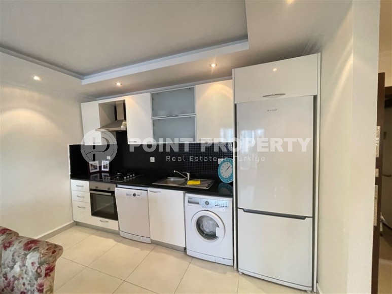 Furnished apartment 1+1, with a total area of 65 m2, in a comfortable residential complex with hotel infrastructure, built in 2014.-id-7562-photo-4