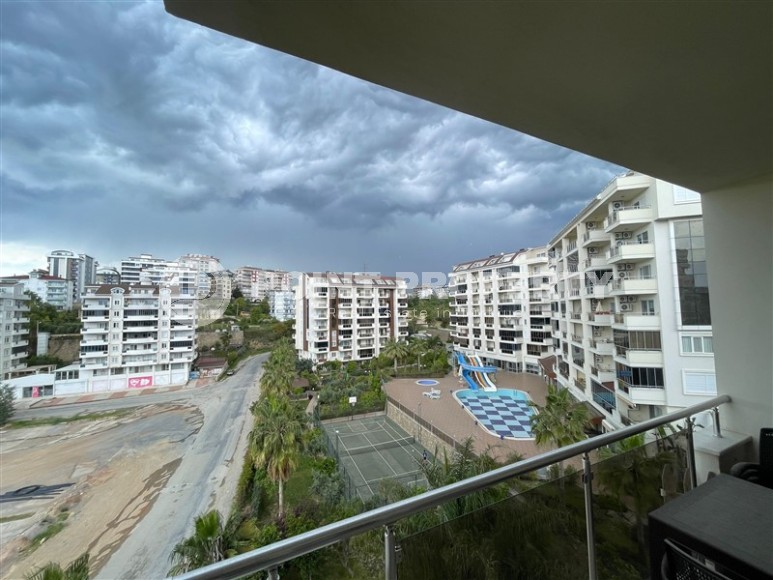 Furnished apartment 1+1, with a total area of 65 m2, in a comfortable residential complex with hotel infrastructure, built in 2014.-id-7562-photo-11