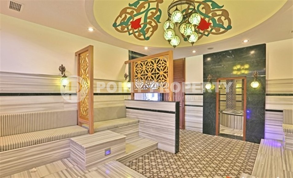 Furnished apartment 1+1, with a total area of 65 m2, in a comfortable residential complex with hotel infrastructure, built in 2014.-id-7562-photo-14