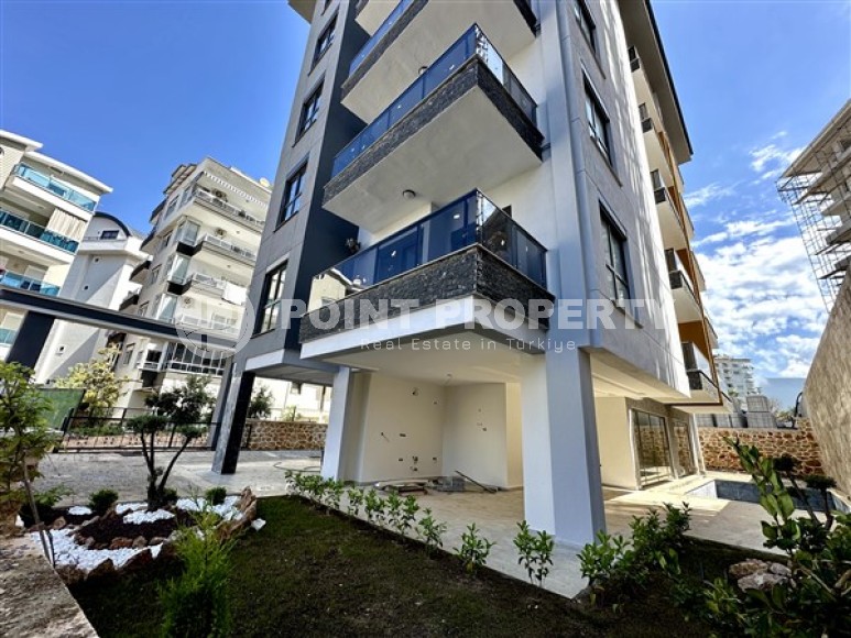 Небольшая новая квартира с чистовой отделкой в 350 метрах от моря, в центре спокойного района Аланьи - Тосмур-id-7383-фото-13