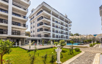 Apartments 2+1 and 3+1 from the developer in a modern complex 200 meters from the sea, Kargicak-id-1084-photo-7