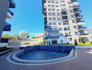 Apartments and duplexes in a new 9-storey residential complex in the resort area of Alanya - Avsallar-id-7575-photo-4