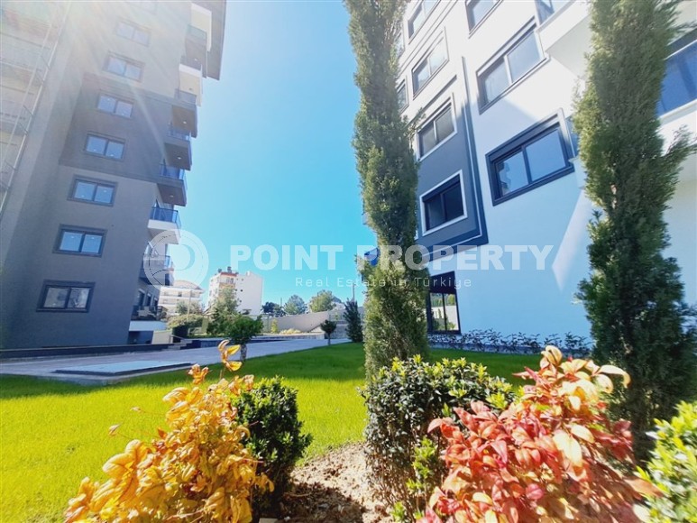 Apartments and duplexes in a new 9-storey residential complex in the resort area of Alanya - Avsallar-id-7575-photo-12