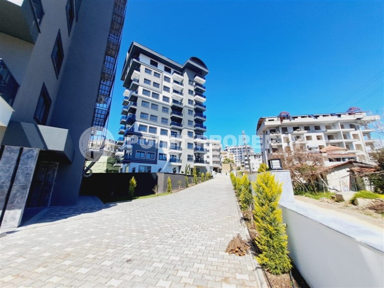 Apartments and duplexes in a new 9-storey residential complex in the resort area of Alanya - Avsallar-id-7575-photo-17