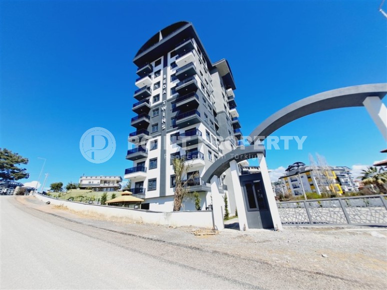 Apartments and duplexes in a new 9-storey residential complex in the resort area of Alanya - Avsallar-id-7575-photo-18