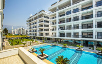 Apartments 2+1 and 3+1 from the developer in a modern complex 200 meters from the sea, Kargicak-id-1084-photo-9