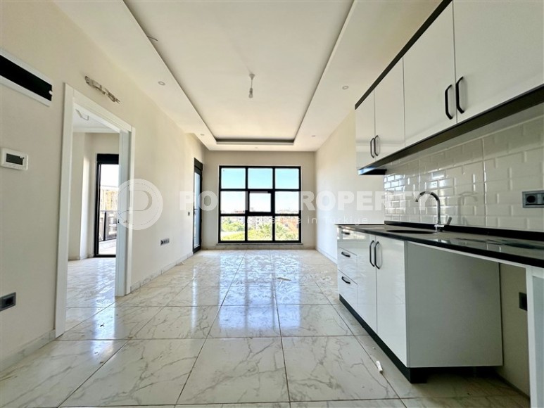 Spacious, bright 1+1 apartment one and a half kilometers from the sea, in a new area of Alanya - Upper Oba-id-7578-photo-2