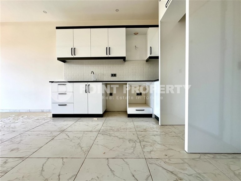 Spacious, bright 1+1 apartment one and a half kilometers from the sea, in a new area of Alanya - Upper Oba-id-7578-photo-3