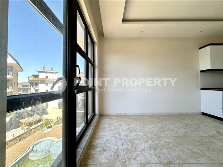 Spacious, bright 1+1 apartment one and a half kilometers from the sea, in a new area of Alanya - Upper Oba-id-7578-photo-4