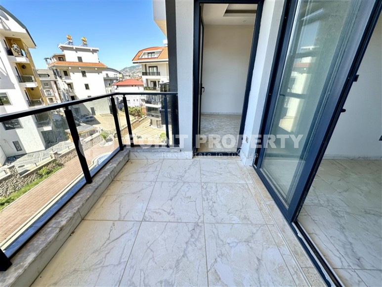 Spacious, bright 1+1 apartment one and a half kilometers from the sea, in a new area of Alanya - Upper Oba-id-7578-photo-9