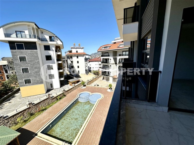 Spacious, bright 1+1 apartment one and a half kilometers from the sea, in a new area of Alanya - Upper Oba-id-7578-photo-11