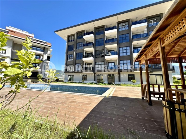 Spacious, bright 1+1 apartment one and a half kilometers from the sea, in a new area of Alanya - Upper Oba-id-7578-photo-17