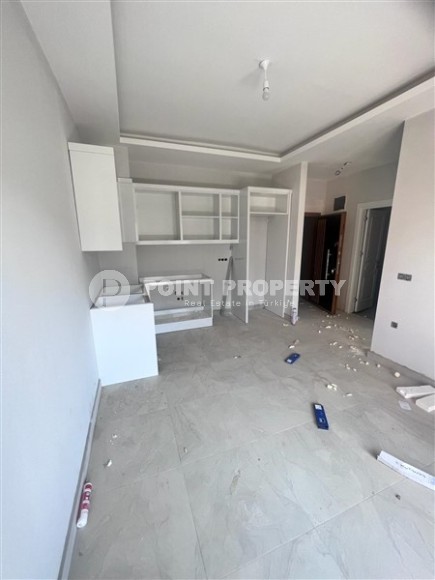 Небольшая новая квартира с чистовой отделкой в 800 метрах от моря, в спокойном районе Аланьи - Демирташ-id-7580-фото-2