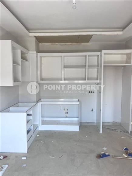 Небольшая новая квартира с чистовой отделкой в 800 метрах от моря, в спокойном районе Аланьи - Демирташ-id-7580-фото-3