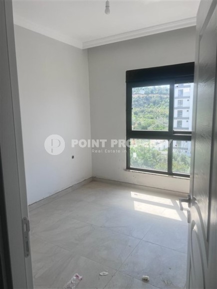 Небольшая новая квартира с чистовой отделкой в 800 метрах от моря, в спокойном районе Аланьи - Демирташ-id-7580-фото-4