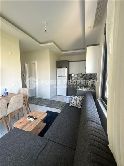 Small ready-to-move-in apartment 1+1, with a total area of 50 m2, in a new, investment-attractive area of Alanya - Upper Oba-id-7587-photo-3
