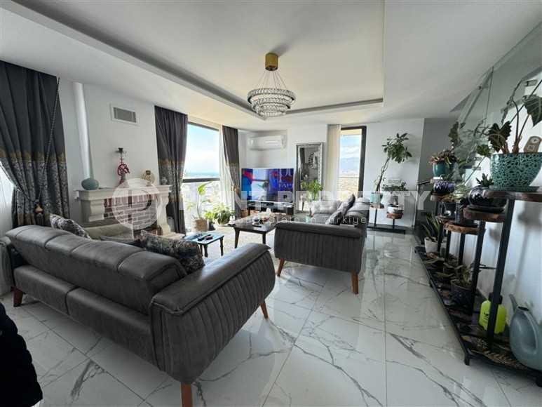 Комфортабельная двухуровневая квартира с видом на море и горы, в центре современного района Аланьи - Махмутлар-id-7593-фото-1