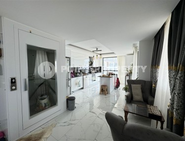 Комфортабельная двухуровневая квартира с видом на море и горы, в центре современного района Аланьи - Махмутлар-id-7593-фото-3