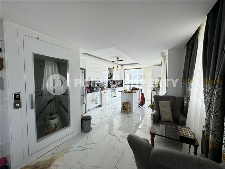 Комфортабельная двухуровневая квартира с видом на море и горы, в центре современного района Аланьи - Махмутлар-id-7593-фото-3