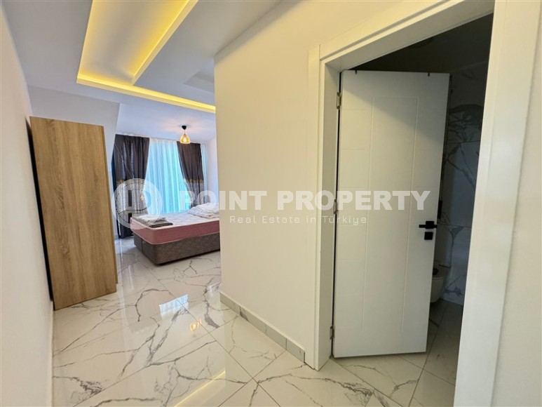 Комфортабельная двухуровневая квартира с видом на море и горы, в центре современного района Аланьи - Махмутлар-id-7593-фото-7