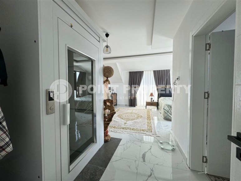 Комфортабельная двухуровневая квартира с видом на море и горы, в центре современного района Аланьи - Махмутлар-id-7593-фото-8