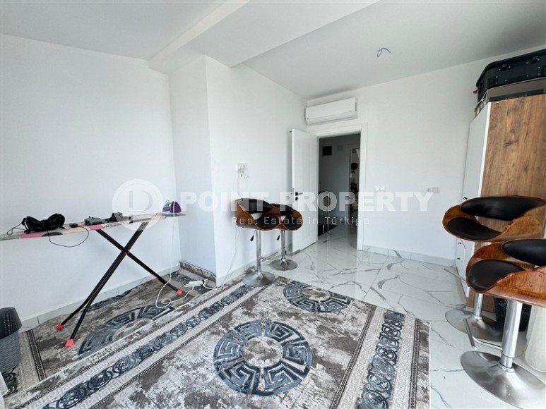 Комфортабельная двухуровневая квартира с видом на море и горы, в центре современного района Аланьи - Махмутлар-id-7593-фото-10