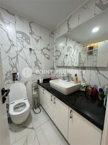 Комфортабельная двухуровневая квартира с видом на море и горы, в центре современного района Аланьи - Махмутлар-id-7593-фото-11