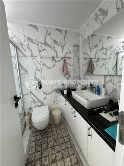 Комфортабельная двухуровневая квартира с видом на море и горы, в центре современного района Аланьи - Махмутлар-id-7593-фото-12