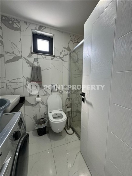 Комфортабельная двухуровневая квартира с видом на море и горы, в центре современного района Аланьи - Махмутлар-id-7593-фото-13