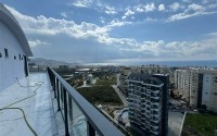 Комфортабельная двухуровневая квартира с видом на море и горы, в центре современного района Аланьи - Махмутлар-id-7593-фото-19