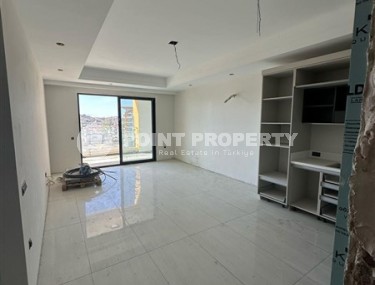 Apartment 1+1 in an ultra-modern residential complex at the final stage of construction, in a picturesque, environmentally friendly area of Alanya - Turkler-id-7602-photo-3