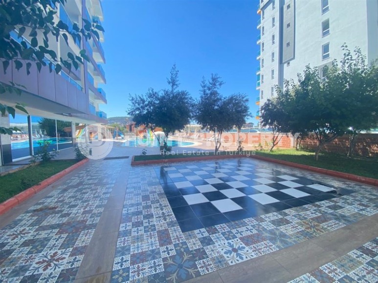 Ready-to-move-in apartment 1+1, with a total area of 70 m2, in the center of the modern area of Alanya - Mahmutlar-id-7617-photo-16