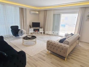 Большая линейная квартира 3+1, общей площадью 190 м2, в нескольких минутах ходьбы от центра района Махмутлар-id-7619-фото-1