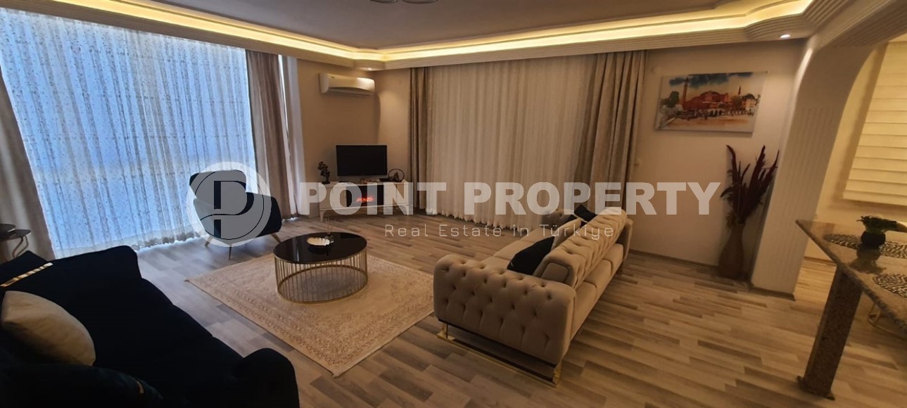 Большая линейная квартира 3+1, общей площадью 190 м2, в нескольких минутах ходьбы от центра района Махмутлар-id-7619-фото-2