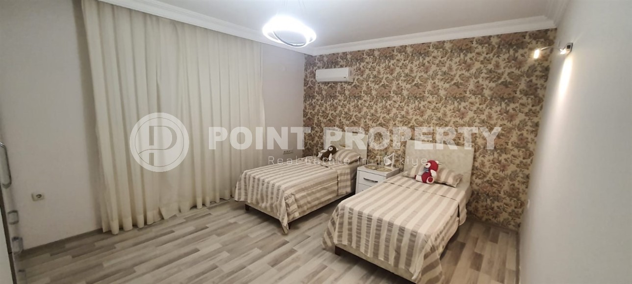 Большая линейная квартира 3+1, общей площадью 190 м2, в нескольких минутах ходьбы от центра района Махмутлар-id-7619-фото-8