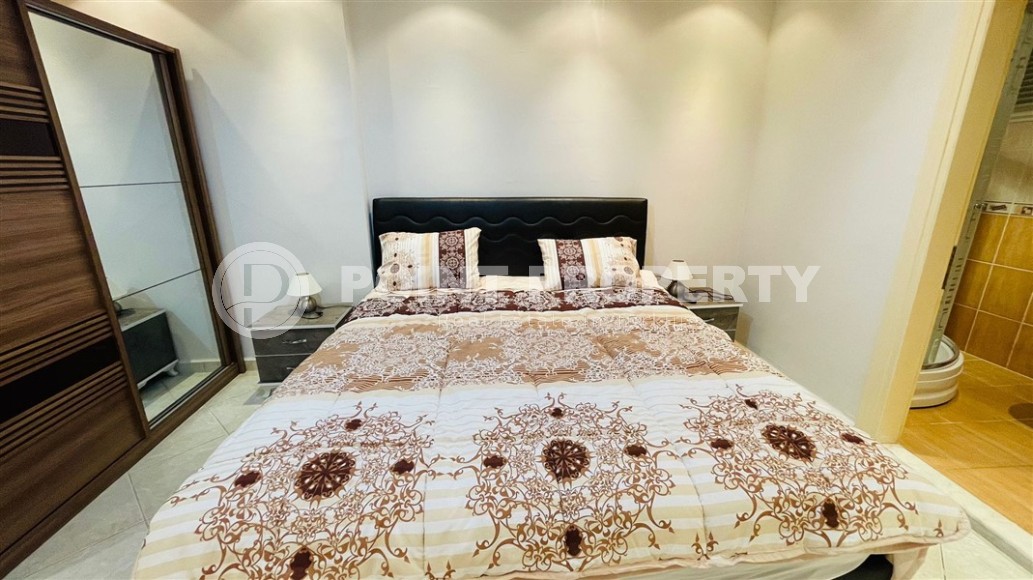 Inexpensive apartment with two bedrooms and spacious glazed balconies in the center of Mahmutlar-id-7624-photo-4