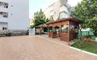 Inexpensive apartment with two bedrooms and spacious glazed balconies in the center of Mahmutlar-id-7624-photo-16