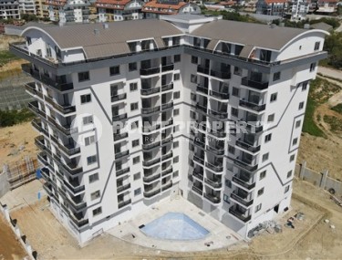 Compact apartment on the 7th floor in a residential complex at the final stage of construction, in a quiet area of Alanya - Payallar-id-7625-photo-1