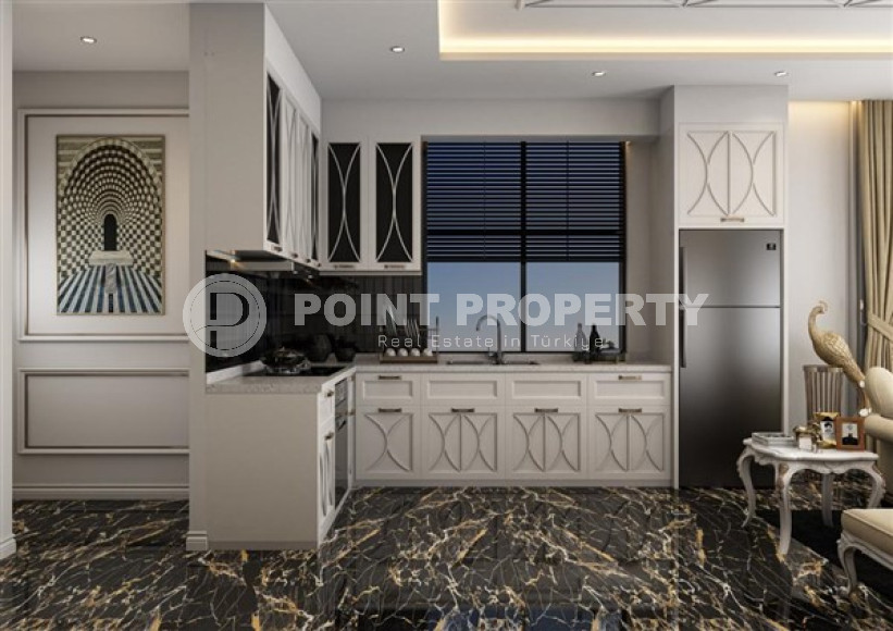 Don't miss a great chance: a new investment project 100m from the sea in the center of Alanya-id-1588-photo-17