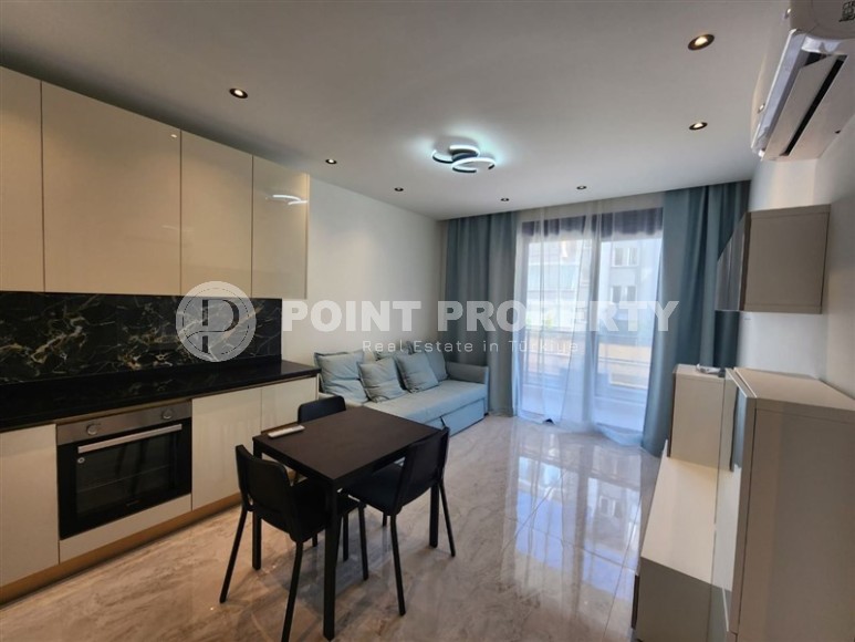 Новая готовая к проживанию квартира 1+1 в 250 метрах от моря, в  центре европейского района Аланьи - Оба-id-7628-фото-2