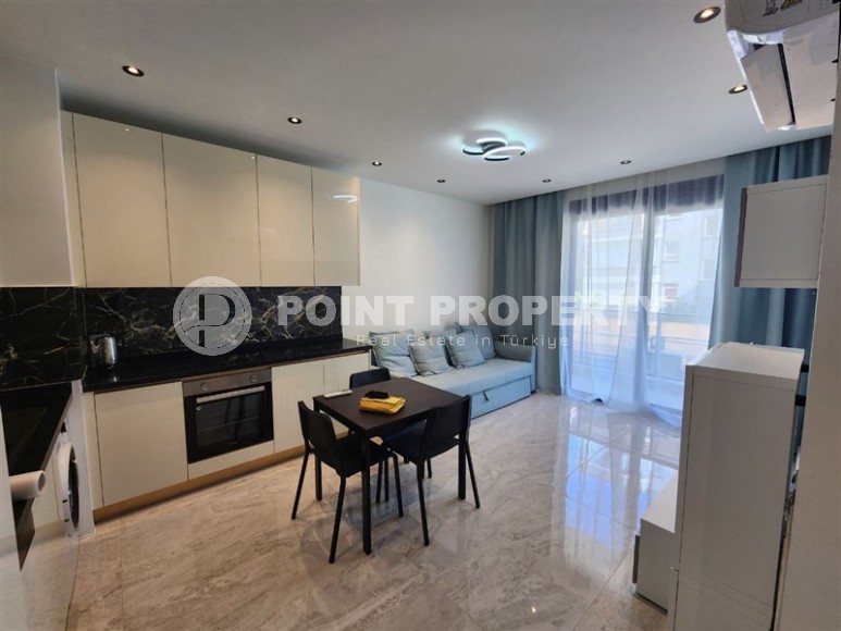 Новая готовая к проживанию квартира 1+1 в 250 метрах от моря, в  центре европейского района Аланьи - Оба-id-7628-фото-5