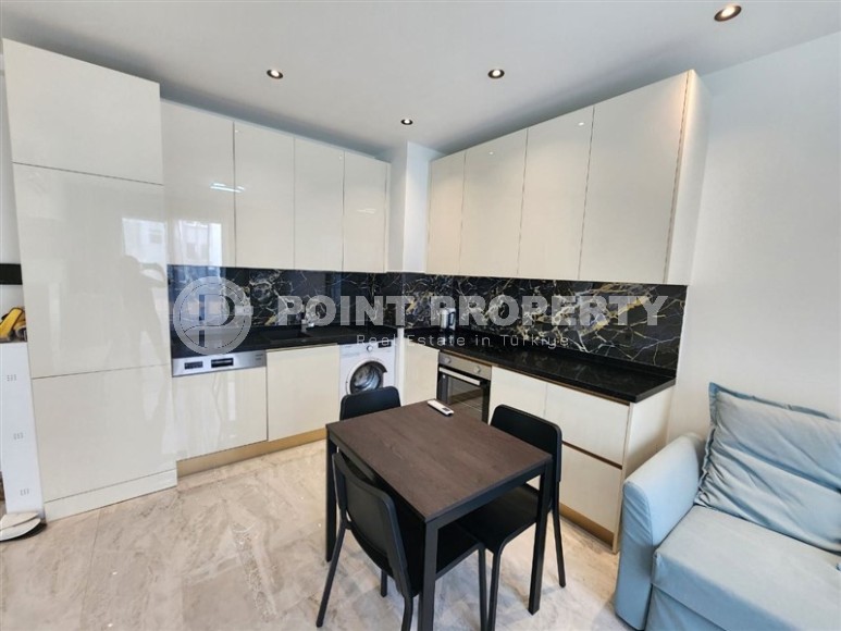 Новая готовая к проживанию квартира 1+1 в 250 метрах от моря, в  центре европейского района Аланьи - Оба-id-7628-фото-6