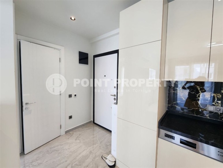 Новая готовая к проживанию квартира 1+1 в 250 метрах от моря, в  центре европейского района Аланьи - Оба-id-7628-фото-9